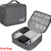 A gray leather cable storage organizer bag shown closed and open displaying various cables and accessories.