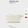 Ivory fleece crossbody belt bag shown from the front
