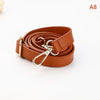 A brown PU leather strap with a gold-tone clasp is shown rolled up.