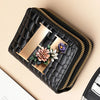 A black PU leather double-zip clutch wallet featuring a gold accent and a floral design.