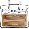 A felt bag organizer insert showing a zippered pocket and a separate slot for storage.