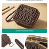 A dark brown Bagsmart coin purse and card holder wallet with a quilted texture, showing its detachable handle and exquisite z