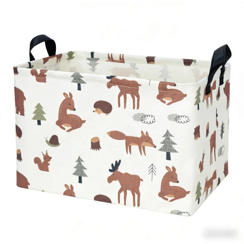 A white fabric storage basket with handles and a lid, featuring a woodland animal pattern.