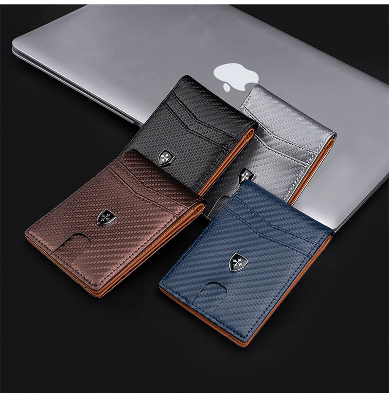 A stack of slim genuine leather RFID blocking wallets in various shades including black brown gray and blue placed on a lapto