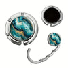 Silver marble pattern portable bag hook and organizer with a circular opening and curved handle