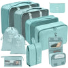A set of light blue fabric storage organizers and pouches for cosmetics and small items.