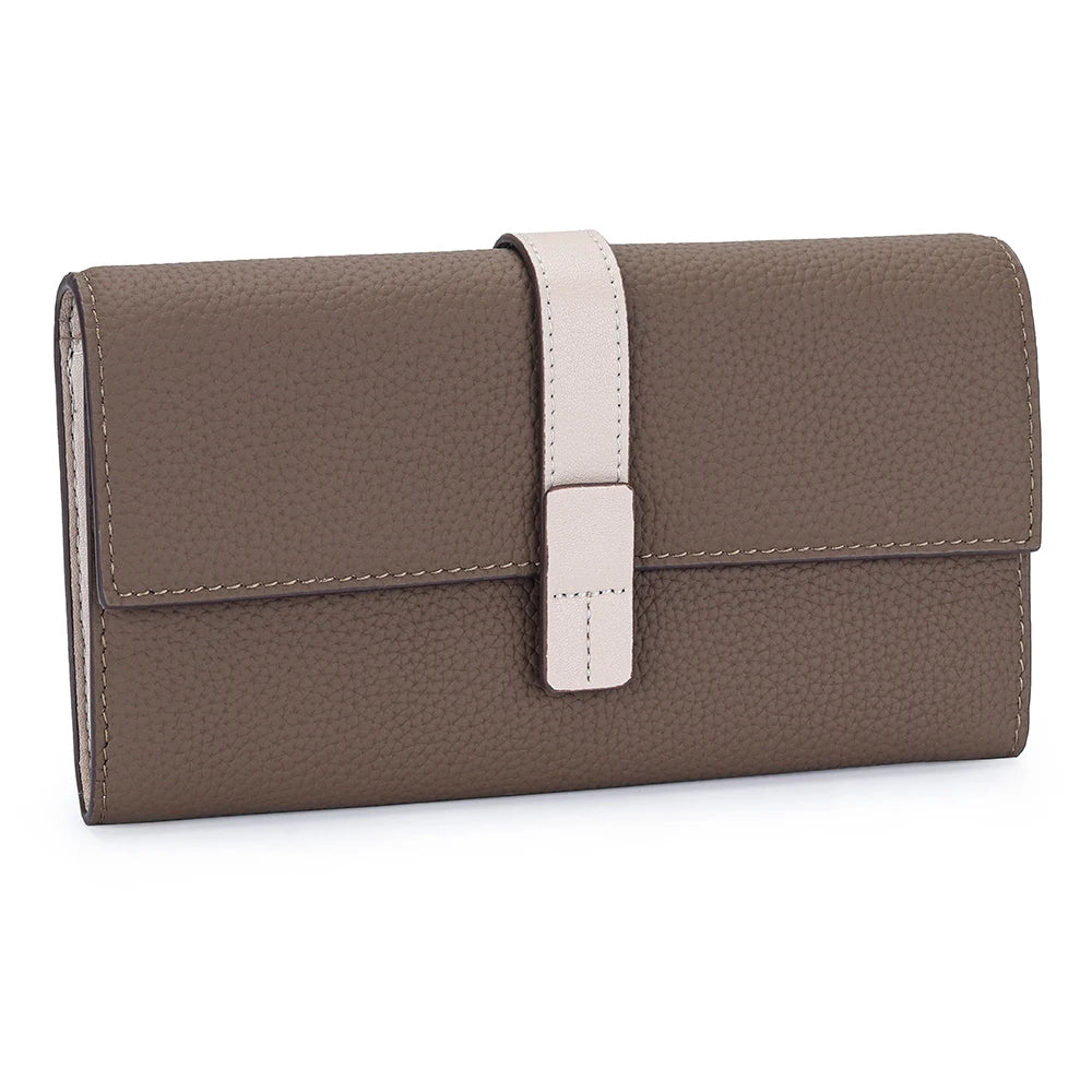 A brown genuine cow leather bifold wallet with a light beige strap shown from the side.