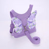 Lila Kindersicherheitsgurt und Leine-Set mit lila Stoff und grünem Blumenmuster