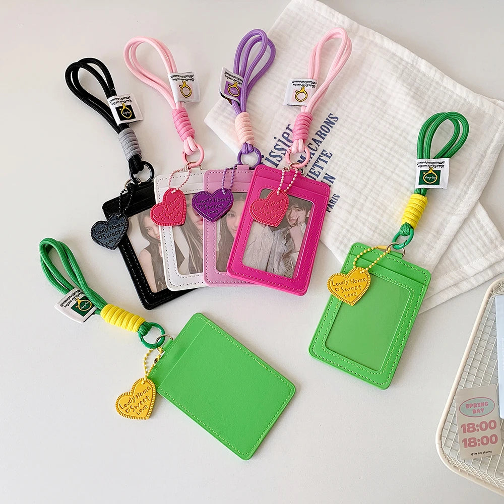 A collection of colorful PU credit card and ID holder keychains featuring various shades of pink, green, and purple.