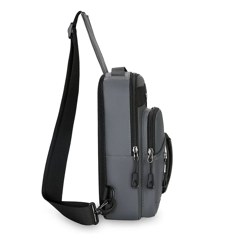 A gray men's multi-compartment nylon crossbody sling bag with a black strap and zippers.