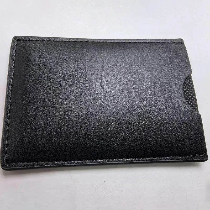 Black leather card holder with a bat-themed texture and a perforated corner.