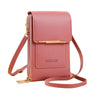 A pink leather crossbody bag with a gold-toned closure and strap.