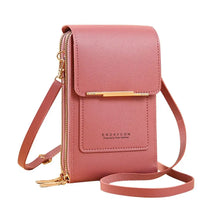 A pink leather crossbody bag with a gold-toned closure and strap.