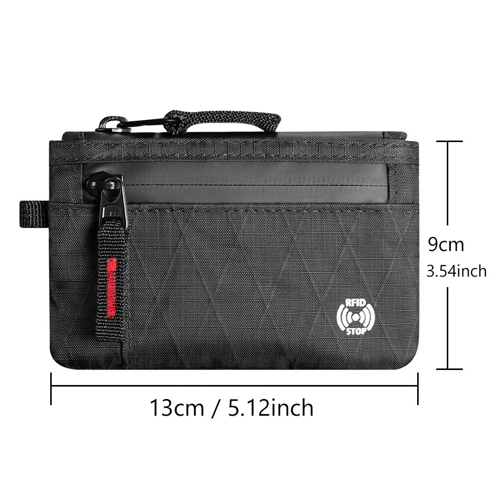 Black RFID blocking travel wallet with a carabiner clip shown flat.