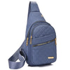 A navy blue quilted crossbody sling bag with gold-toned zippers and a matching strap.
