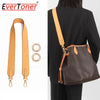 A brown leather shoulder strap with gold hardware is shown alongside a dark brown bag.