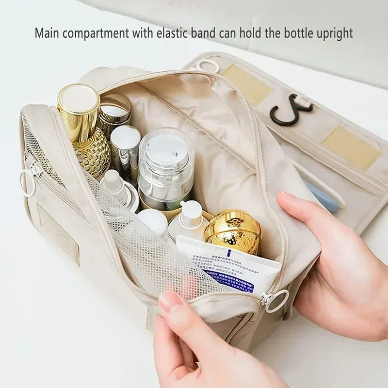 A beige makeup organizer pouch with an elastic band holding various bottles and cosmetics.