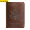 A brown genuine leather passport holder featuring the United States of America eagle emblem embossed on the cover.