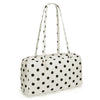 A white nylon shoulder tote bag with black polka dots.