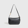A black classic split leather shoulder tote bag with a gold-toned chain strap.