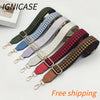 A collection of multi-colored braided nylon bag straps with metal hooks displayed on a white background.