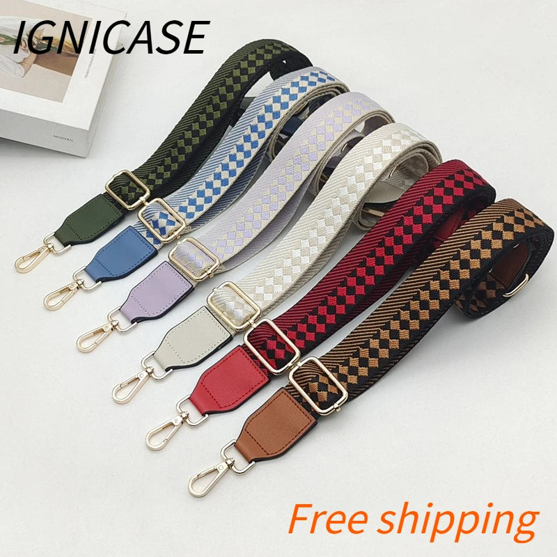 A collection of multi-colored braided nylon bag straps with metal hooks displayed on a white background.