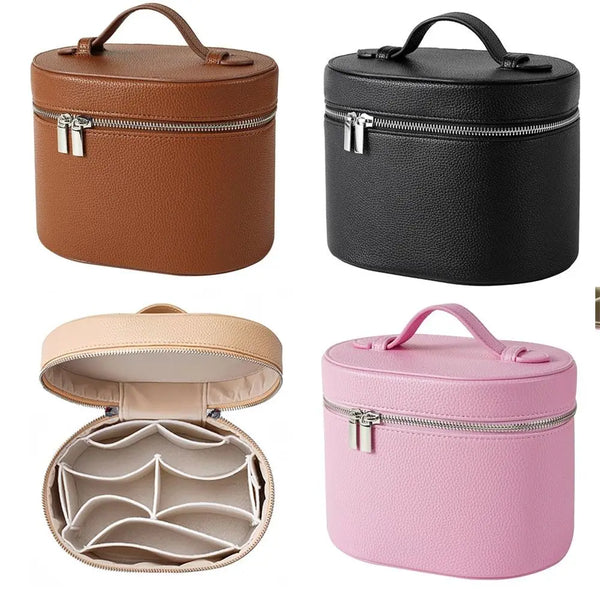 A set of three travel makeup organizers in brown, black, and pink leather-like material with zipper closures.