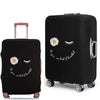 Black rolling suitcase with a face design featuring daisies and eyelashes.