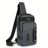 A dark gray adjustable crossbody sling bag with multiple zippered compartments and a black strap.
