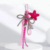 Pink bowknot star keychain charm with silver chain and heart pendant