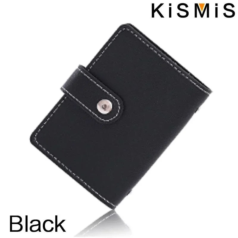 Black KisMIS slim leather card holder with a stitched edge and a metal closure.