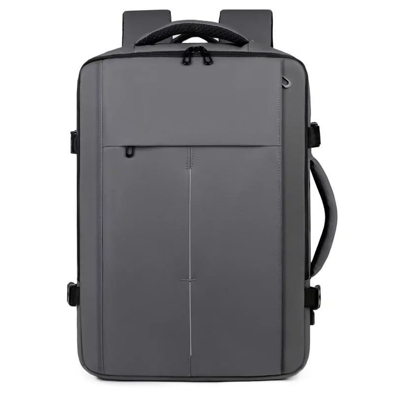 A gray expandable travel backpack designed for carrying a laptop and gear.