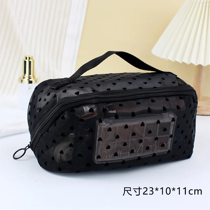 Black mesh transparent makeup storage bag with a clear window and black polka dots