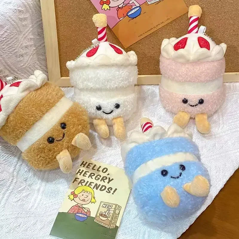 A collection of fluffy bread-themed plush keychains in white, pink, and blue colors.
