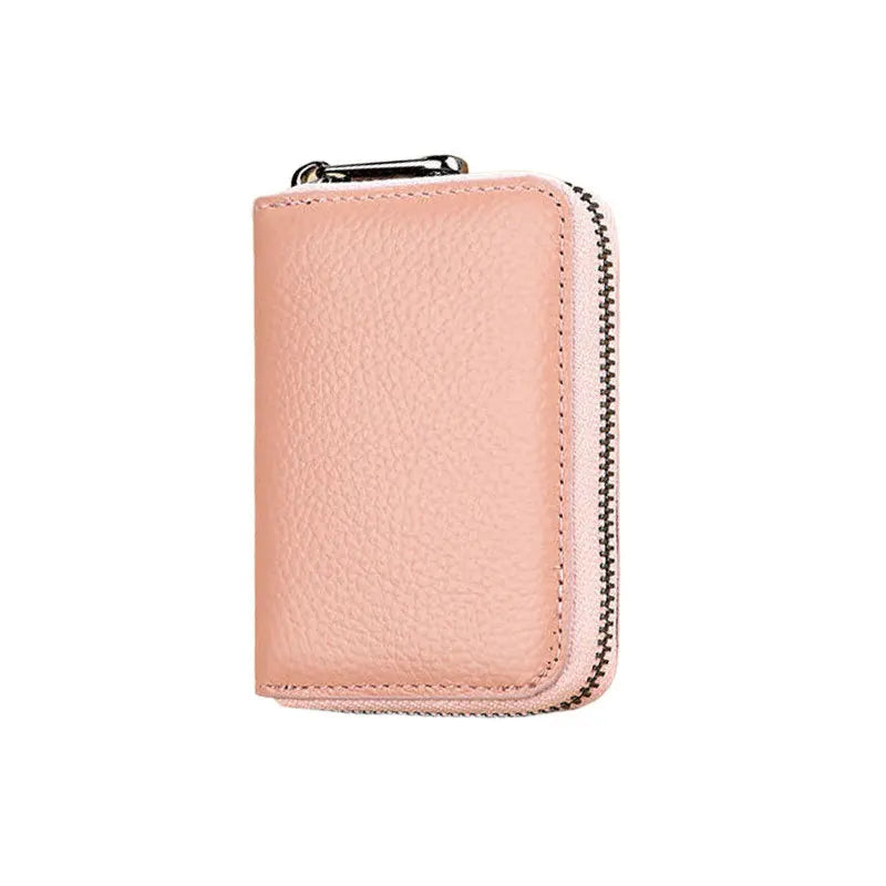 A light pink minimalist RFID blocking card wallet with a zipper pouch.