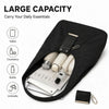 Sac de courses noir en nylon pliable ouvert, contenant des essentiels quotidiens comme une tablette, des cosmétiques et des b