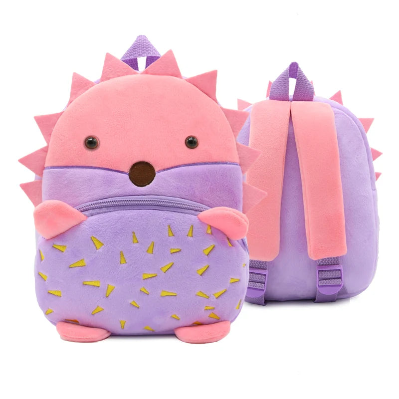 A pink and purple cartoon animal plush backpack with spiky features.