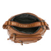 A brown leather tote bag with a flap closure and metal hardware, shown open.