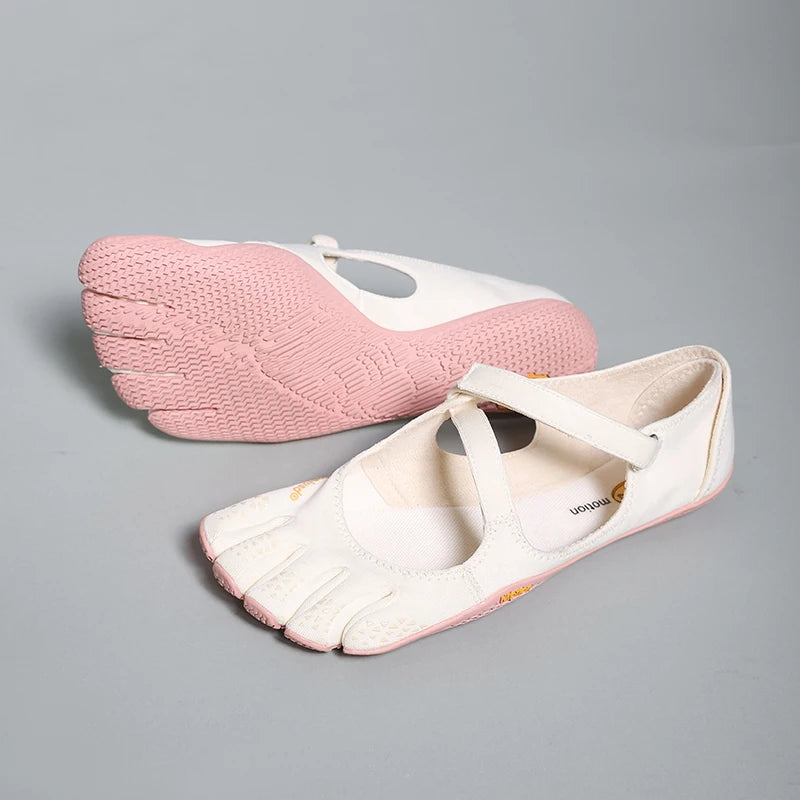 A pair of women's pink and white barefoot five-toe shoes with an adjustable strap shown from the side.