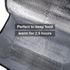 A close-up view of a silver reusable insulated warming bag set with a mesh lining.