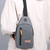 A gray lightweight oxford cloth crossbody bag is shown attached to a white sleeve.