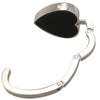 A silver heart-shaped metal foldable bag hook with a curved wire loop.