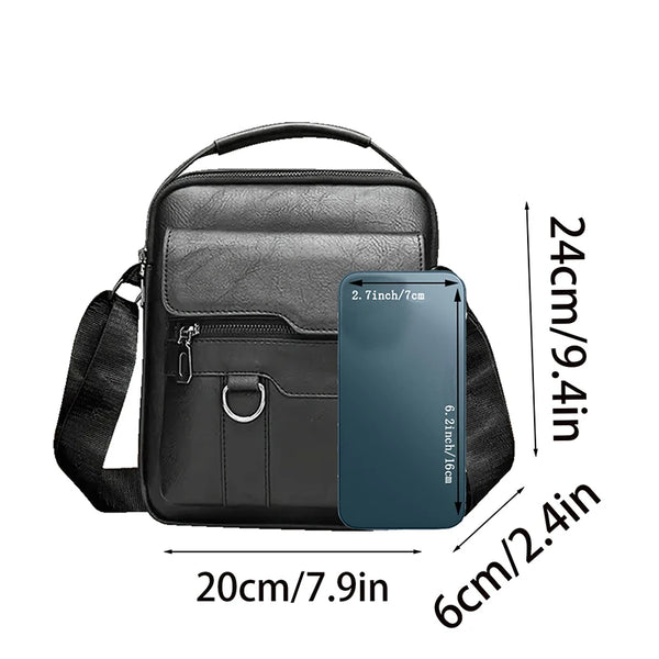 Schwarze Kunstleder-Crossbody-Tasche mit Reißverschluss und Trageriemen.