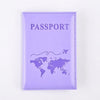 A purple leather passport holder with the word PASSPORT and a world map design.