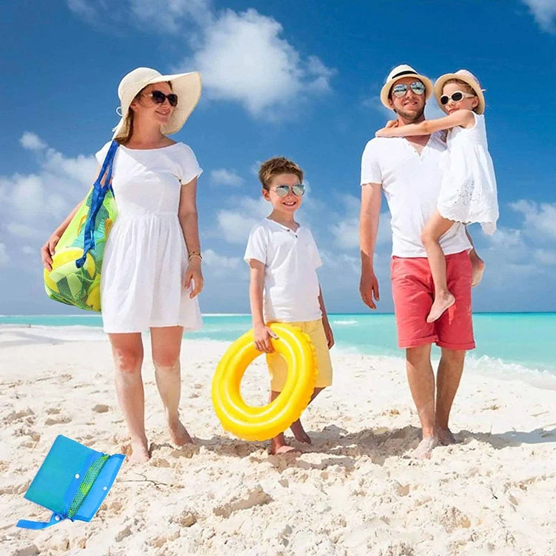A family of three enjoying a beach day with a yellow inflatable ring and a mesh storage bag.