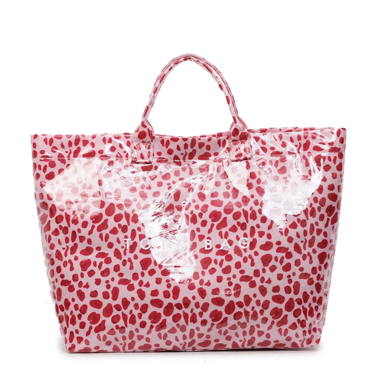 Pinkes Leopardenmuster-PVC-Taschenbeutel mit Henkel.