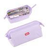 A purple minimalist large capacity pencil case with a clear label holder and various writing tools inside.