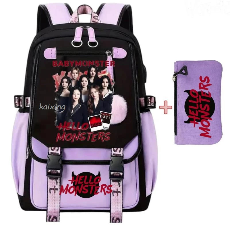 Lila und schwarzes Canvas-Schulrucksack-Set mit Hello Monsters-Grafiken für Schüler.