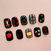 A set of 30 cute cartoon press-on nails featuring various designs including apples and stripes.