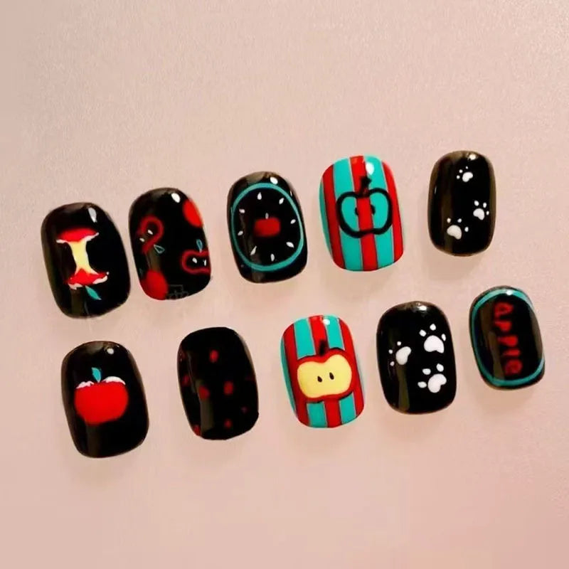 A set of 30 cute cartoon press-on nails featuring various designs including apples and stripes.